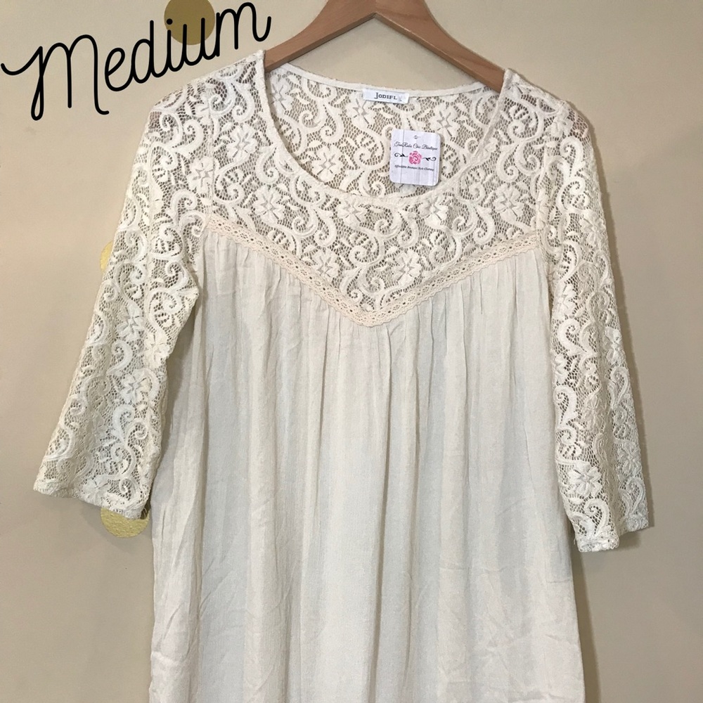 Medium cream blouse with lace detail